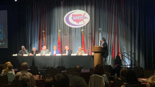 Panel discussion at a conference event.